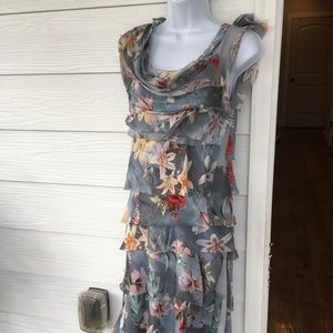 Silk dress with tiered style, sleeveless, round neckline.knee length.